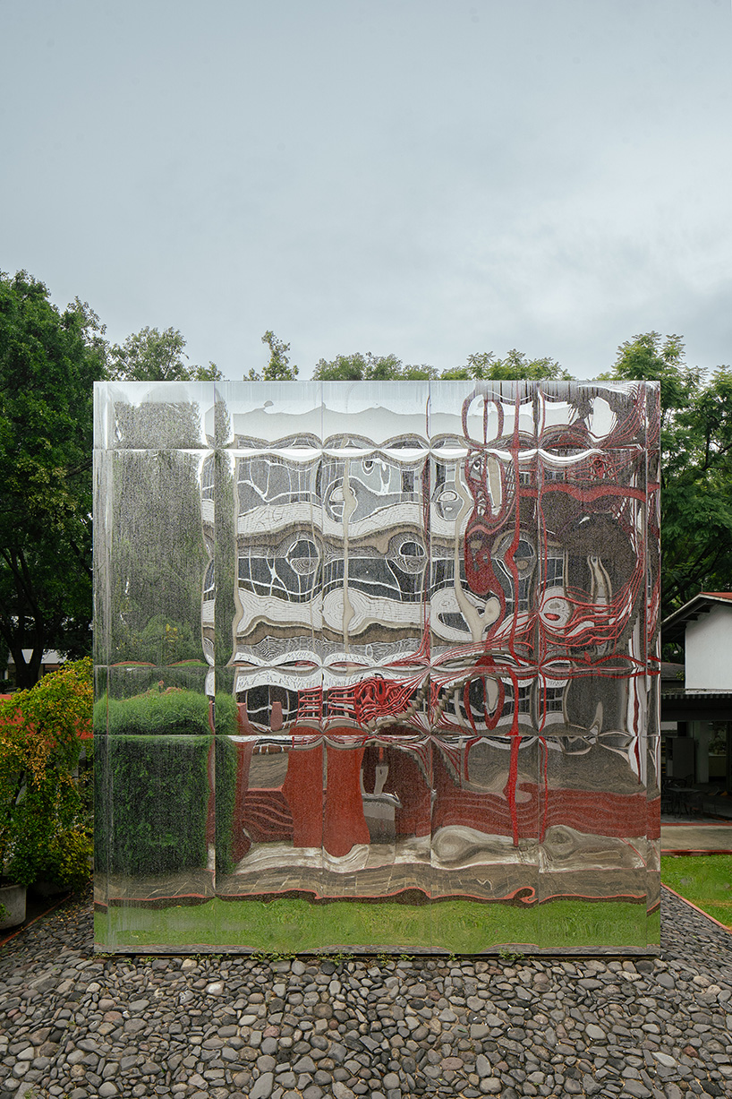 mirrored acrylic skin dissolves cube pavilion into its surroundings in mexico - 2