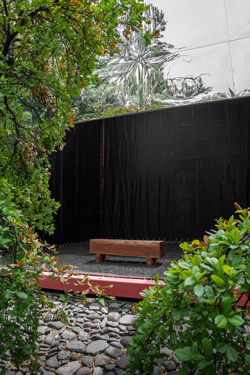 mirrored acrylic skin dissolves cube pavilion into its surroundings in mexico - 7