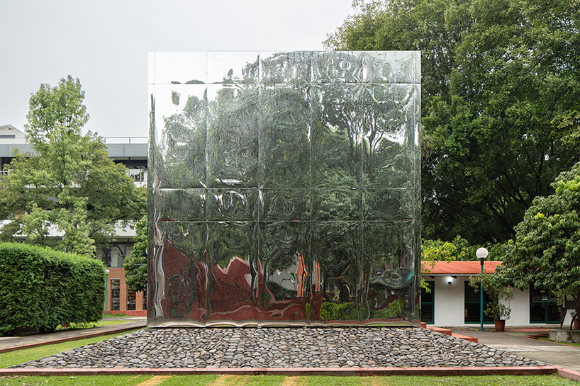 mirrored acrylic skin dissolves cube pavilion into its surroundings in mexico - 1