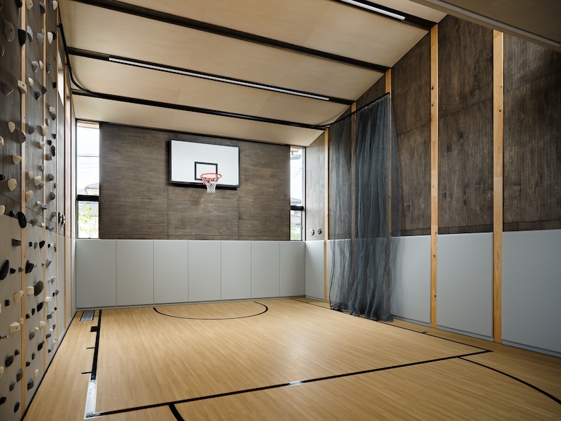 wood-framed family home in osaka revolves around flexible open sports space - 4