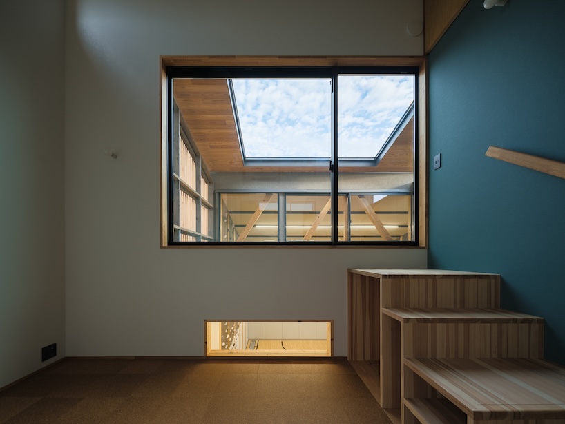 wood-framed family home in osaka revolves around flexible open sports space - 11