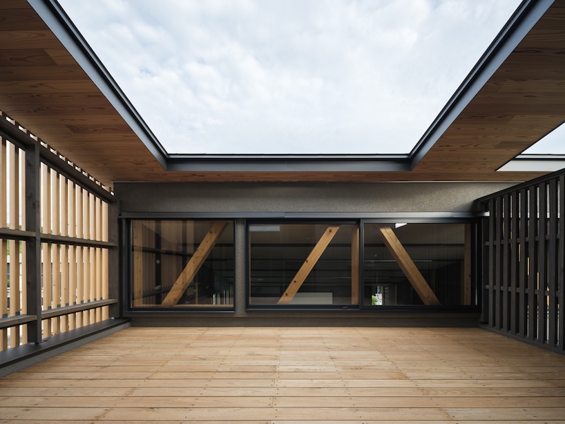 wood-framed family home in osaka revolves around flexible open sports space - 12