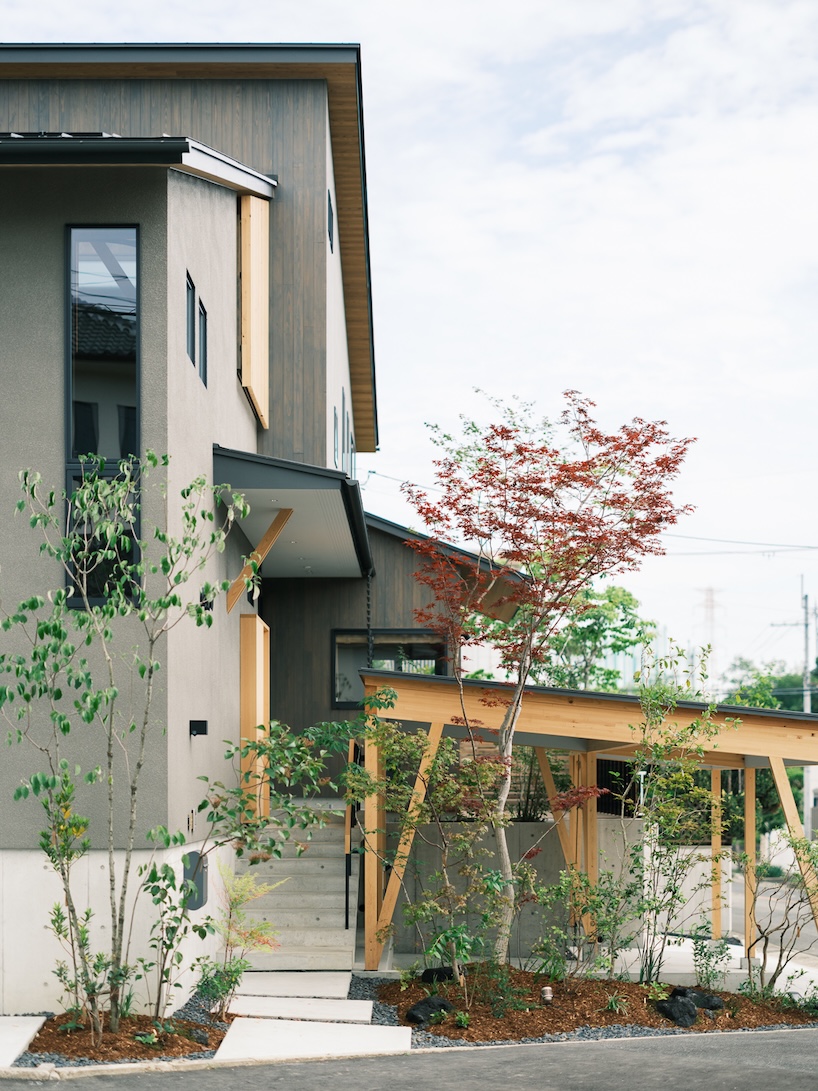 wood-framed family home in osaka revolves around flexible open sports space - 2