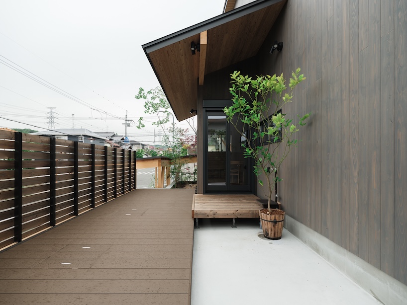 wood-framed family home in osaka revolves around flexible open sports space - 3