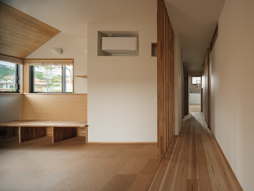 wood-framed family home in osaka revolves around flexible open sports space - 9