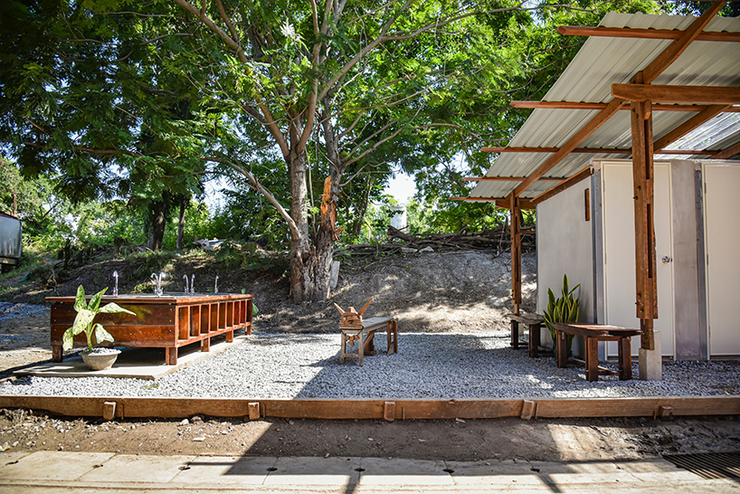 volunteers in thailand hand-build school toilet from reclaimed wood - 1