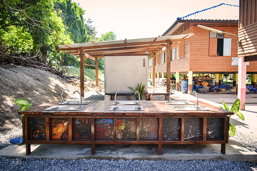 volunteers in thailand hand-build school toilet from reclaimed wood - 2