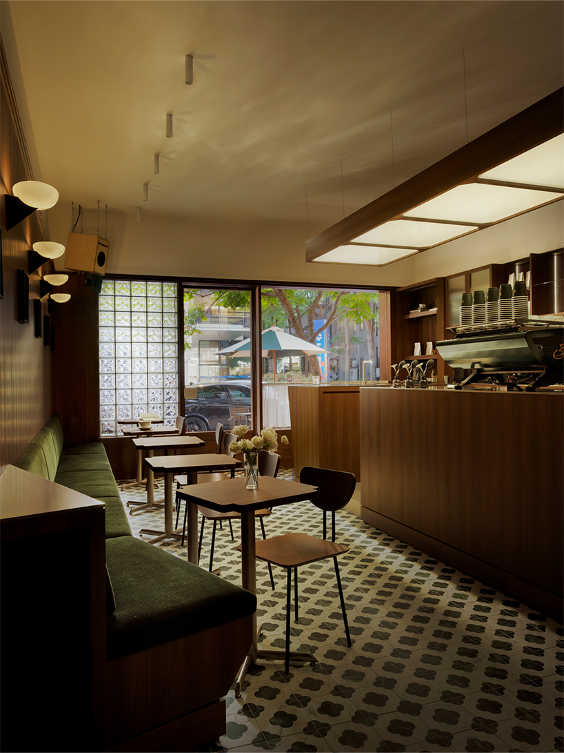 dark wood and deep green turn alfa romeo’s iconic design into caffè fortuna in taipei - 9