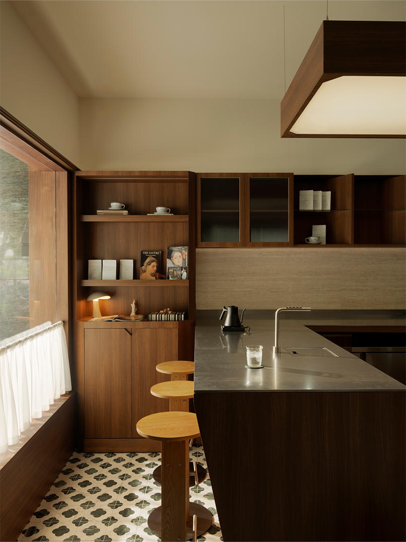 dark wood and deep green turn alfa romeo’s iconic design into caffè fortuna in taipei - 5