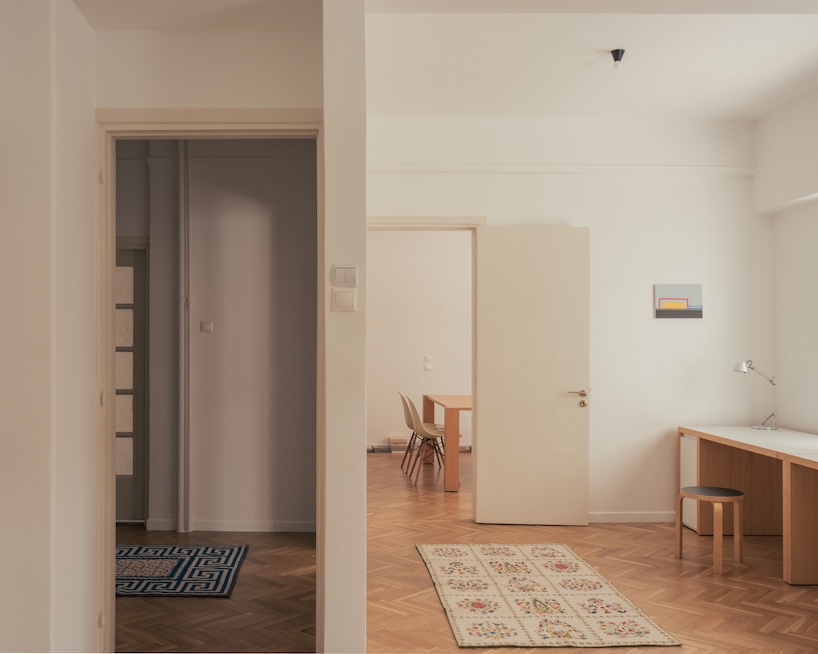 cypress, marble, and rippling glass rework apartment into local local’s athens studio - 6