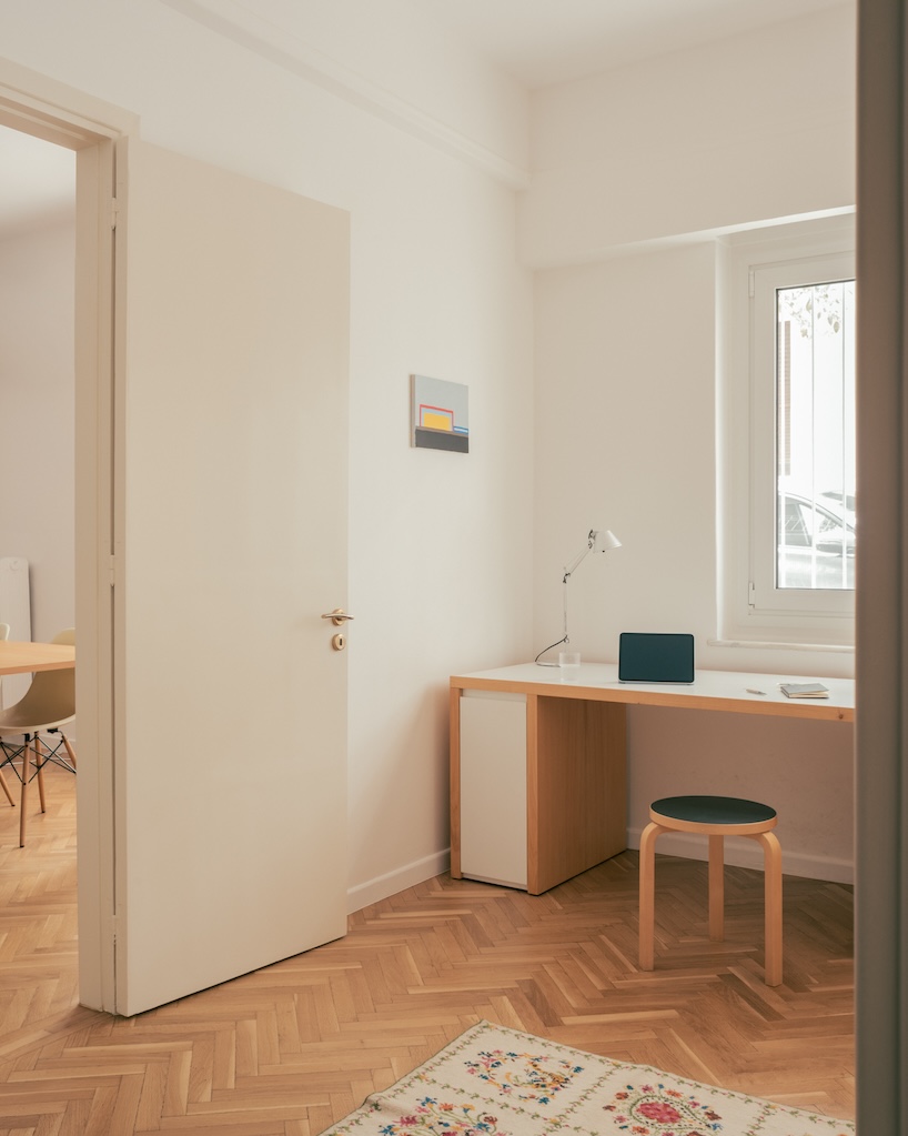 cypress, marble, and rippling glass rework apartment into local local’s athens studio - 7