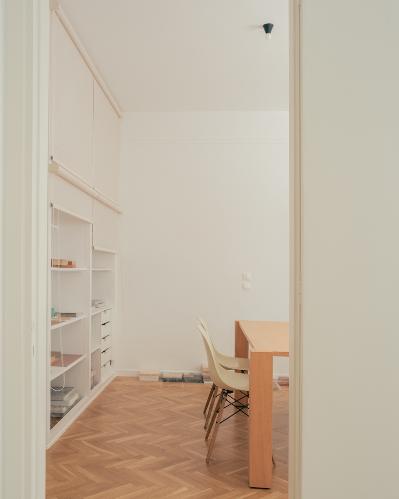 cypress, marble, and rippling glass rework apartment into local local’s athens studio - 8