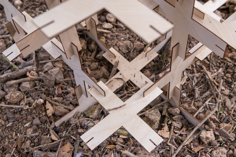 interlocking biodegradable modules weave regenerative pavilion into gavarres landscape - 11