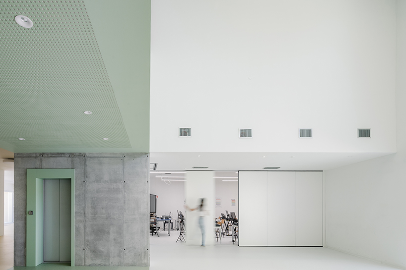 sardinian school wraps in perforated aluminum facade to enclose flexible agorà - 8