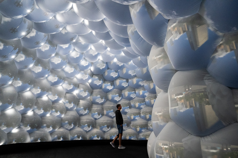inflatable pavilion by pneuhaus mimics dragonfly’s vision through 221 camera obscuras - 6