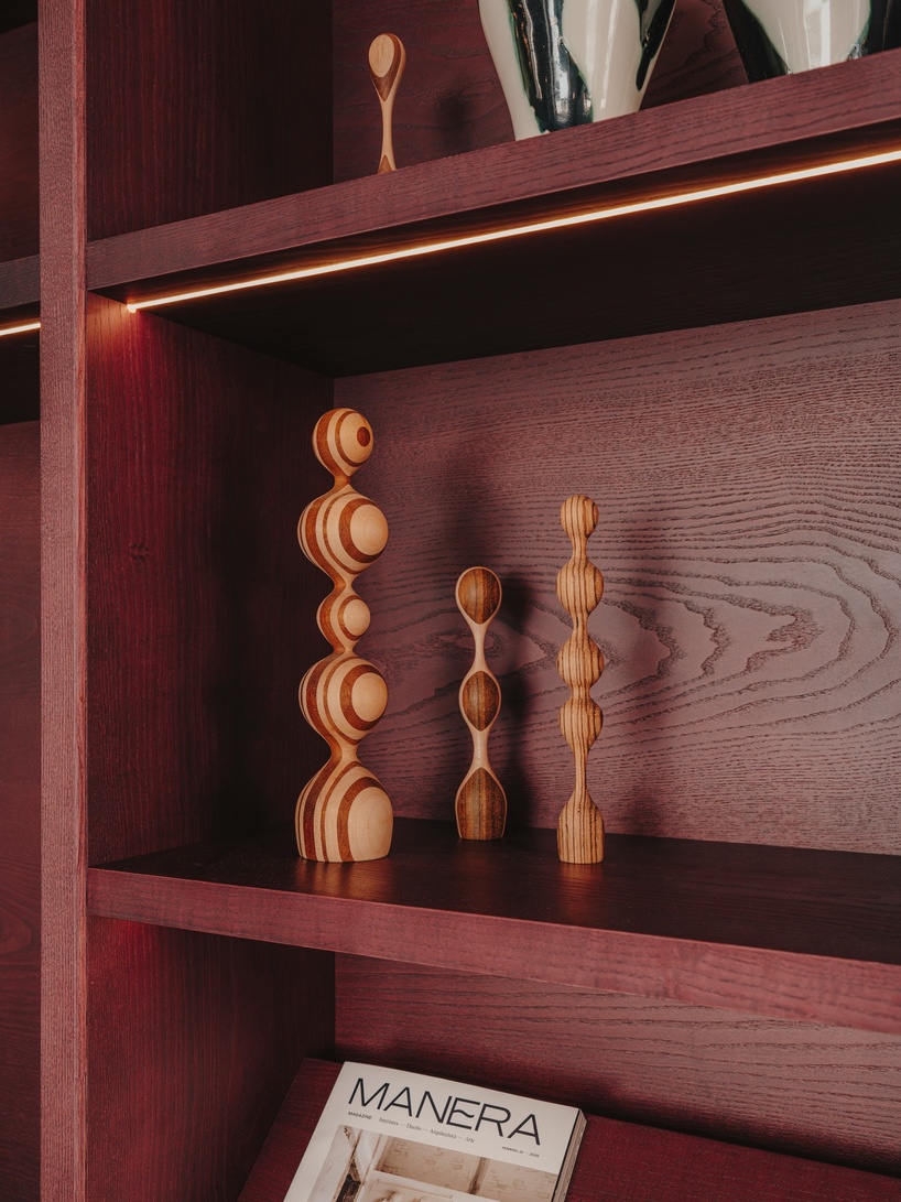 burgundy wood and blue ceilings shape café, bookshop, and wine bar in valencia - 4