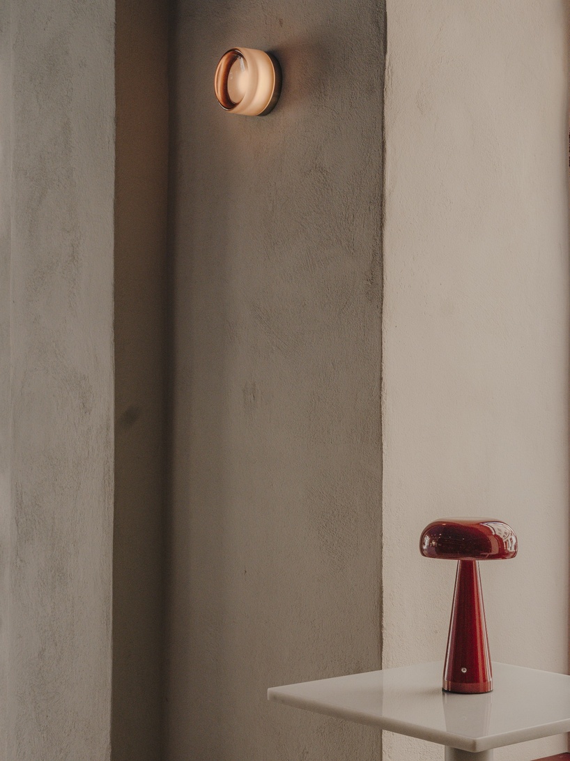 burgundy wood and blue ceilings shape café, bookshop, and wine bar in valencia - 7