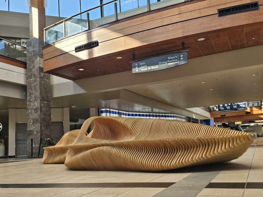undulating plywood layers form stratum parametric public seating sculpture - 1