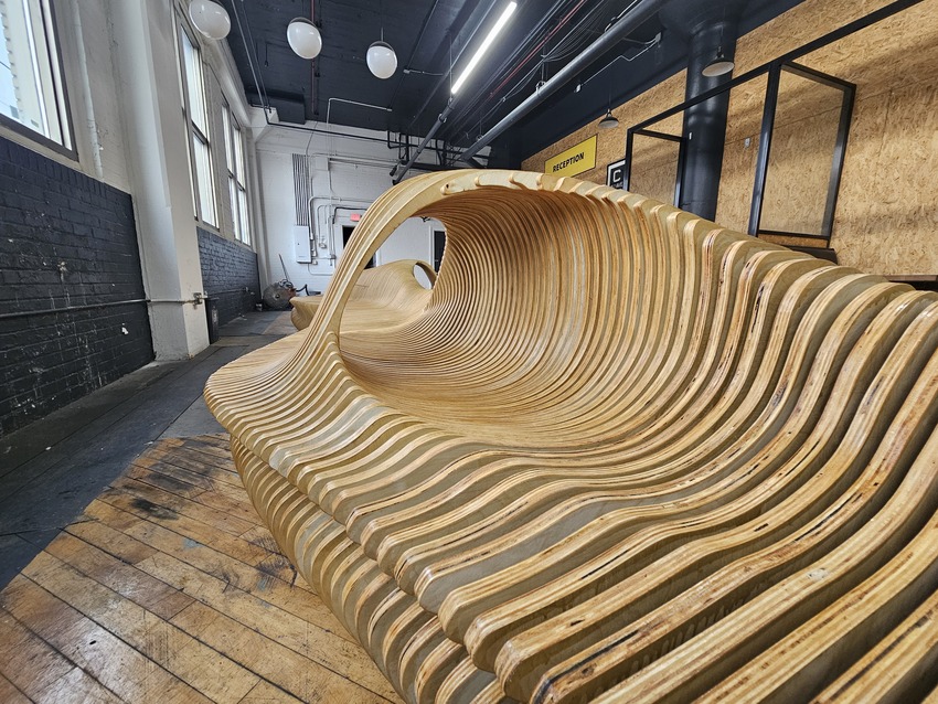 undulating plywood layers form stratum parametric public seating sculpture - 7