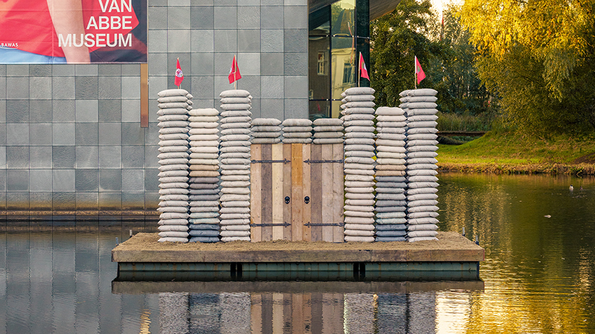 sandbag castle casts sustainable concrete alternatives into floating installation in eindhoven - 2