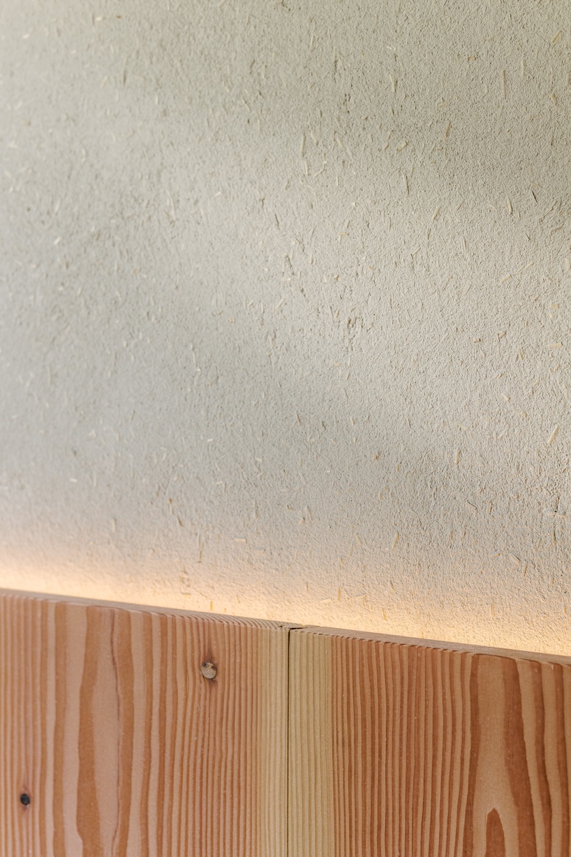 stepped timber platforms and operable textiles shape circular düsseldorf home by urselmann interior - 5