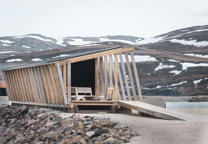 reclaimed timber frames shape skroget coastal sauna and community hub in norway - 3