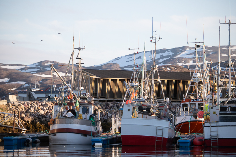 reclaimed timber frames shape skroget coastal sauna and community hub in norway - 2