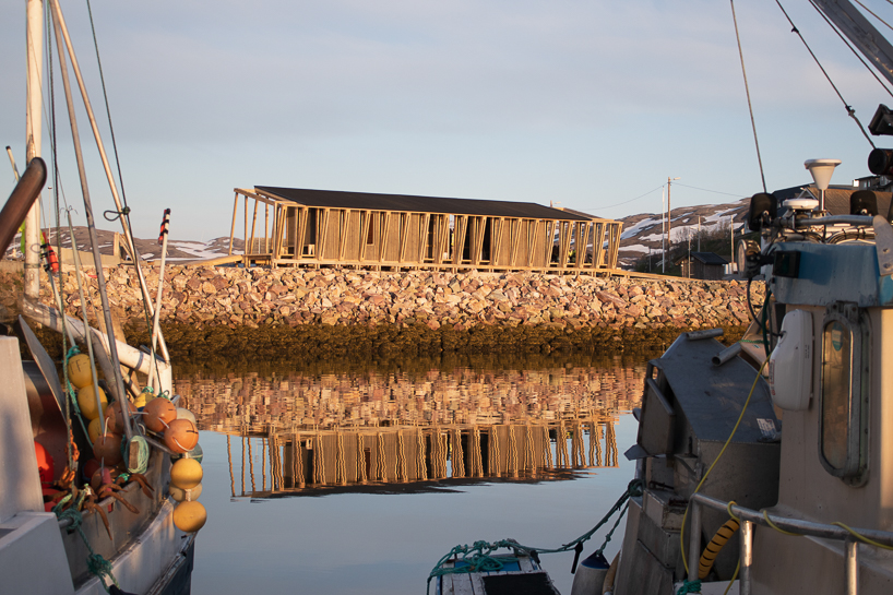 reclaimed timber frames shape skroget coastal sauna and community hub in norway - 1