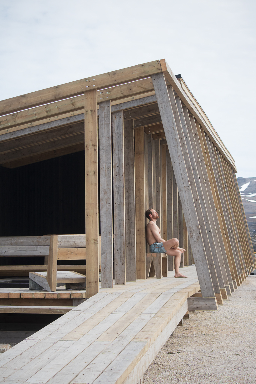 reclaimed timber frames shape skroget coastal sauna and community hub in norway - 4
