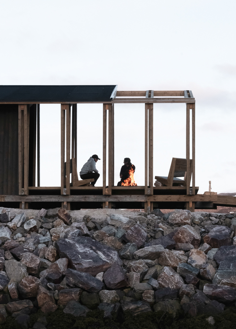 reclaimed timber frames shape skroget coastal sauna and community hub in norway - 7