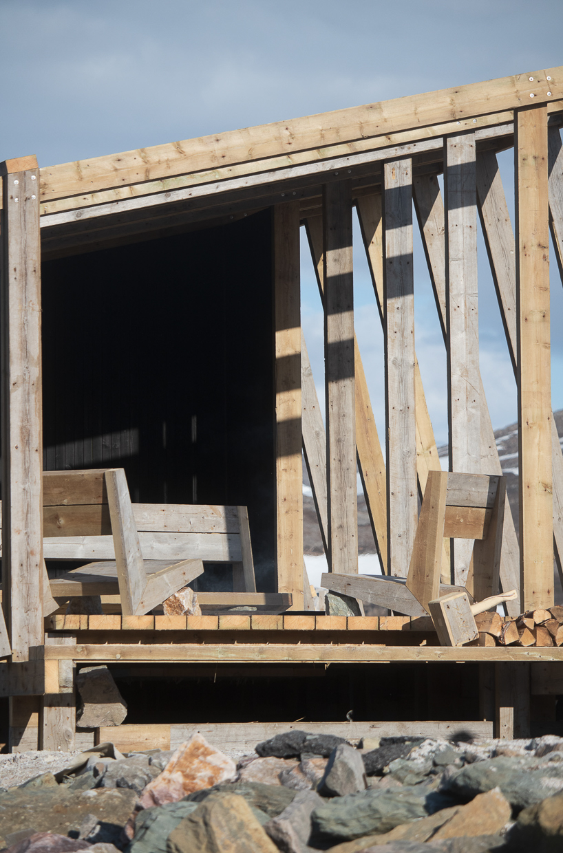 reclaimed timber frames shape skroget coastal sauna and community hub in norway - 8