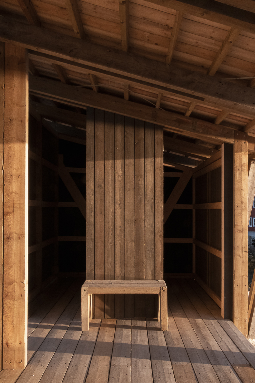 reclaimed timber frames shape skroget coastal sauna and community hub in norway - 10