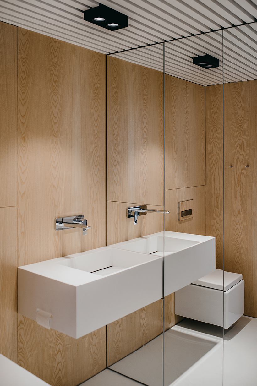 MUS architects' wireframe apartment in cracow is designed to adjust the clients' lifestyle