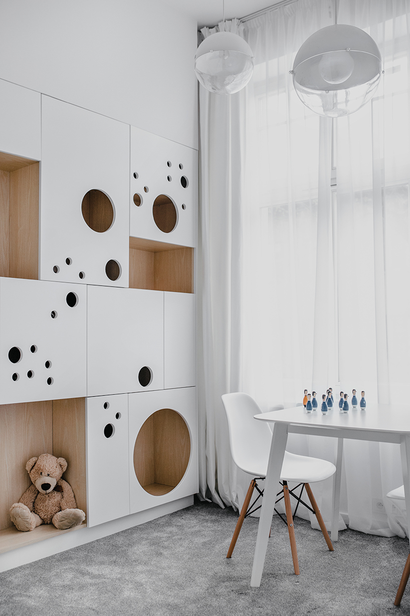 MUS architects' wireframe apartment in cracow is designed to adjust the clients' lifestyle