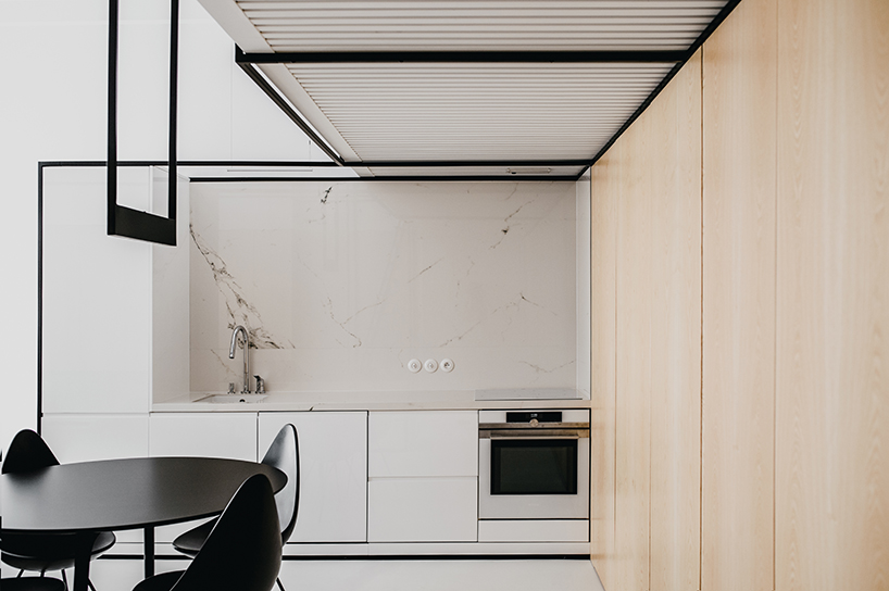MUS architects' wireframe apartment in cracow is designed to adjust the clients' lifestyle