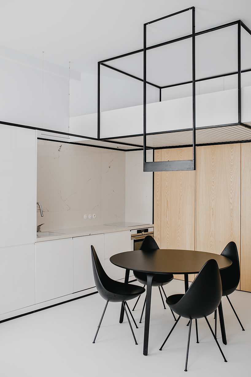 MUS architects' wireframe apartment in cracow is designed to adjust the clients' lifestyle