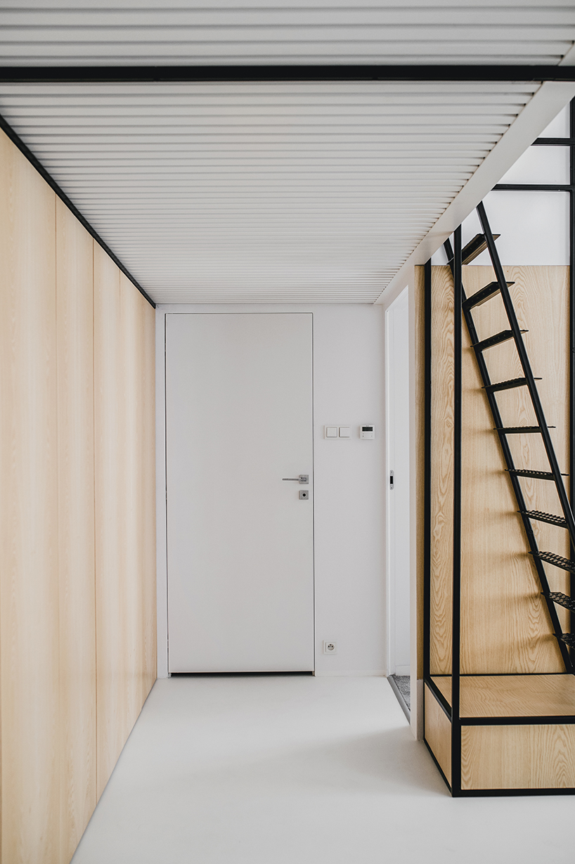 MUS architects' wireframe apartment in cracow is designed to adjust the clients' lifestyle