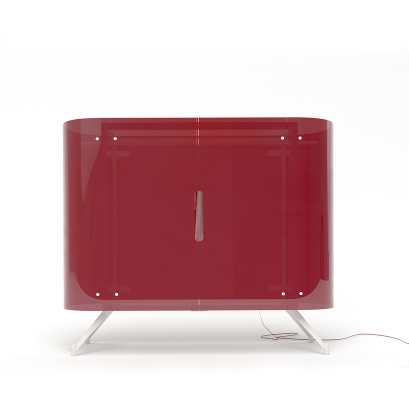 alex schulz adds a statement spotlight to the traditional armoir