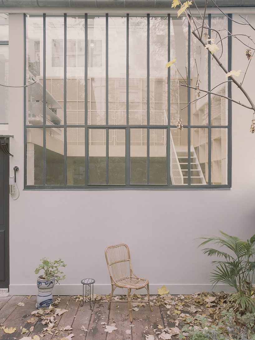 atelier NEA renovates an artist's studio and residence in paris designboom