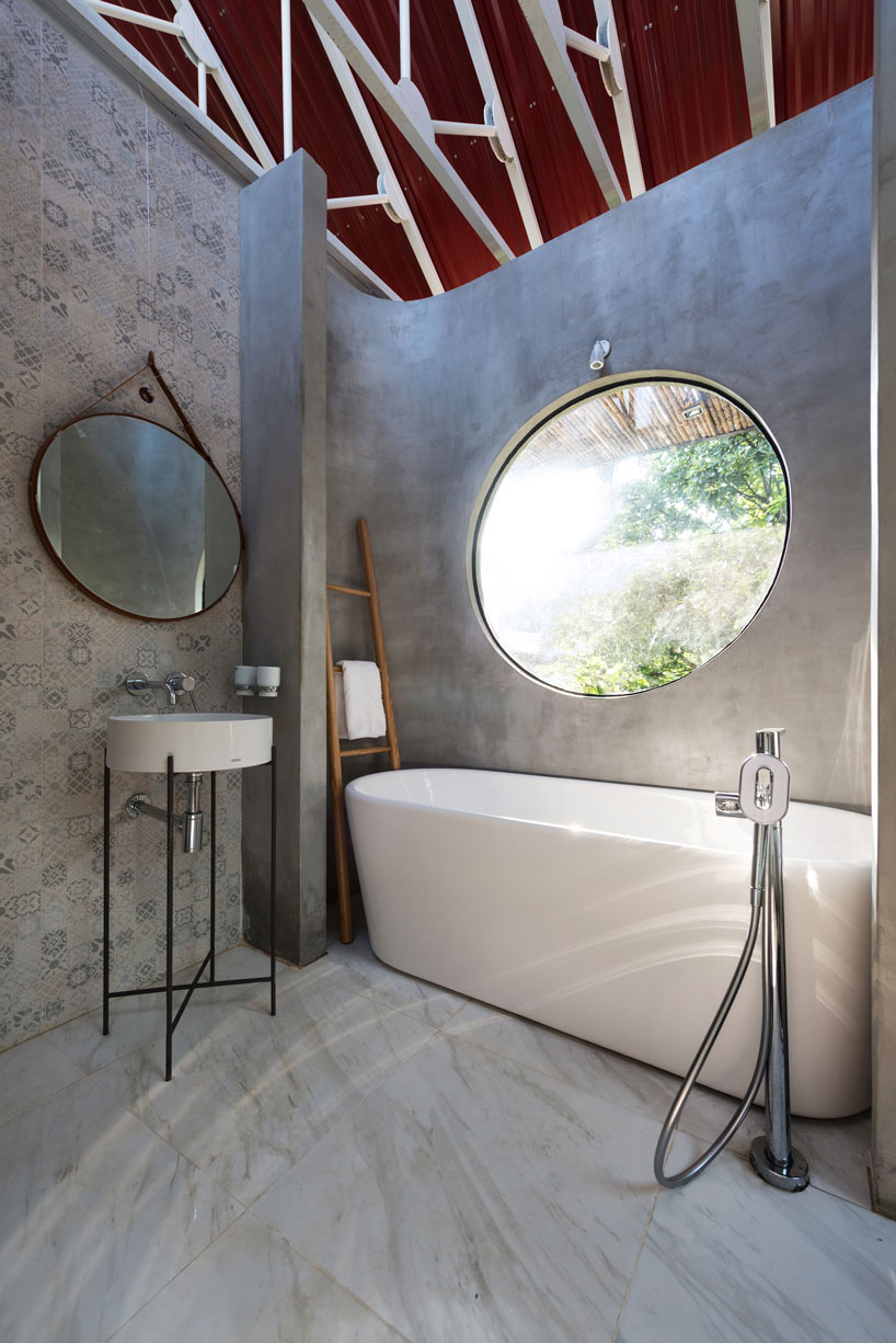 adstudio-stacking-roof-house-vietnam-designboom-16