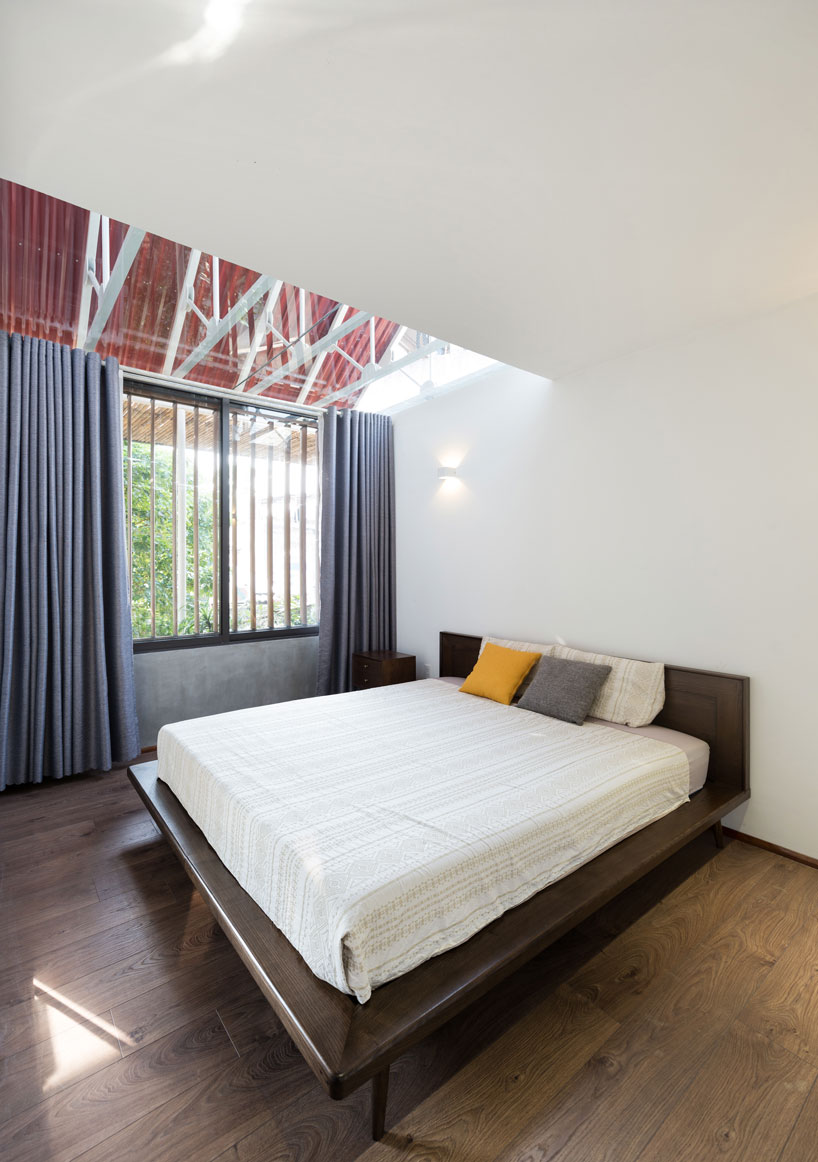 adstudio-stacking-roof-house-vietnam-designboom-18