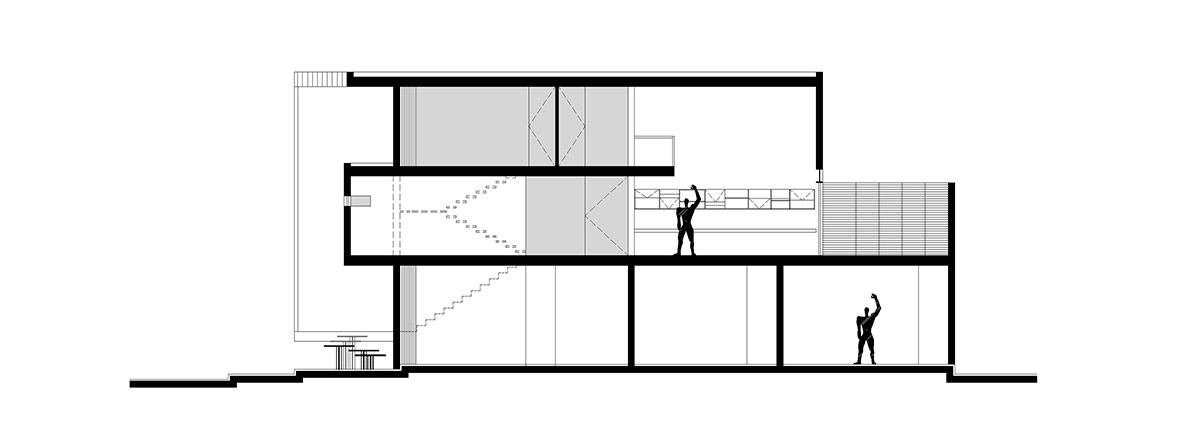 AS arquitectura fits three different offices into a concrete cube