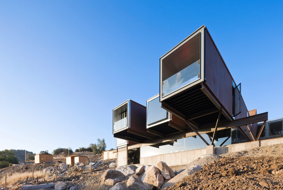 casa oruga: shipping container home snakes across the andes