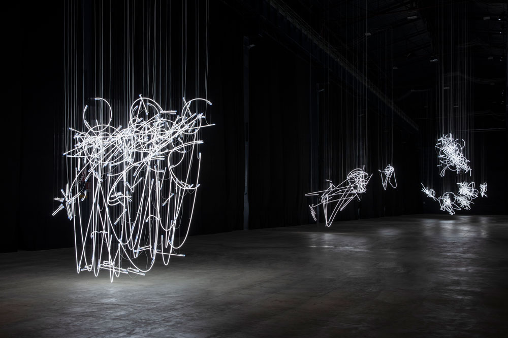 cerith wyn evans hangs neon scribbles in solo exhibition at milan's ...