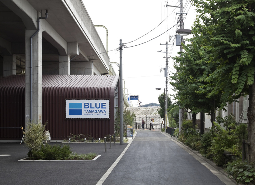 framedesign co blue tamagawa outdoor fitness club railway tokyo designboom