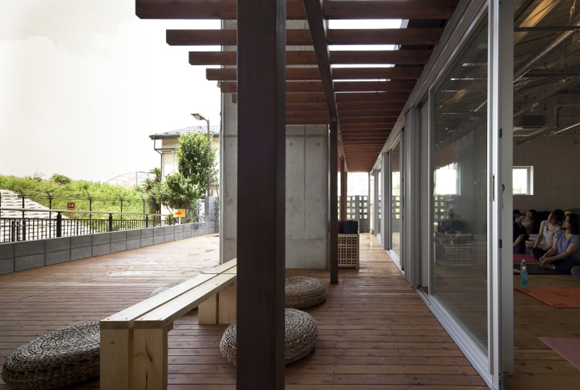 framedesign co blue tamagawa outdoor fitness club railway tokyo designboom