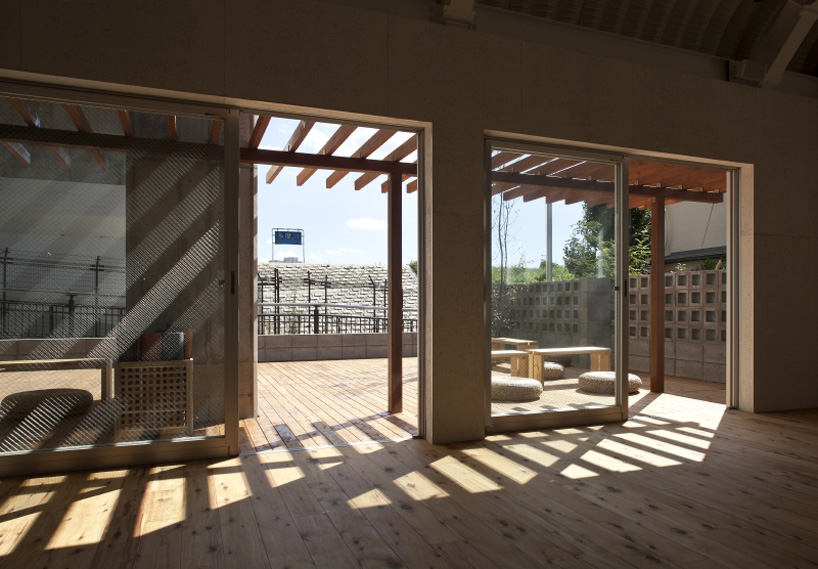framedesign co blue tamagawa outdoor fitness club railway tokyo designboom