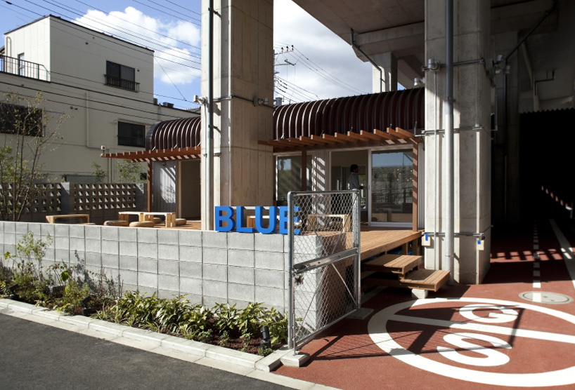 framedesign co blue tamagawa outdoor fitness club railway tokyo designboom