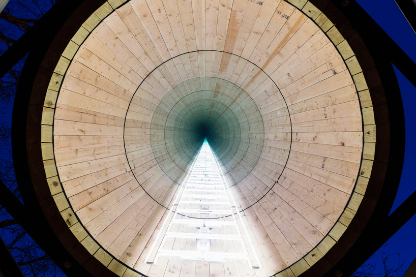 ivan navarro places infinite neons within water tower sculptures