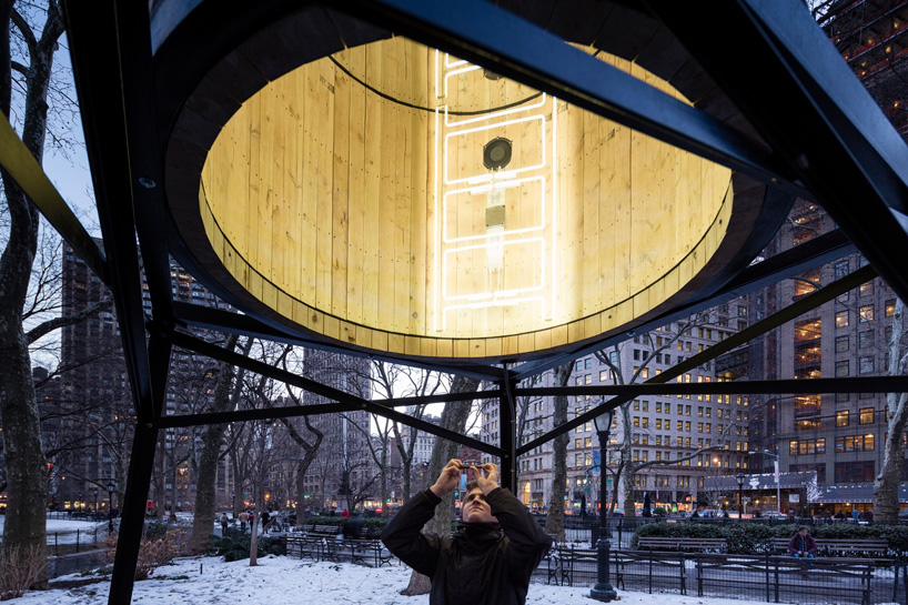ivan navarro places infinite neons within water tower sculptures